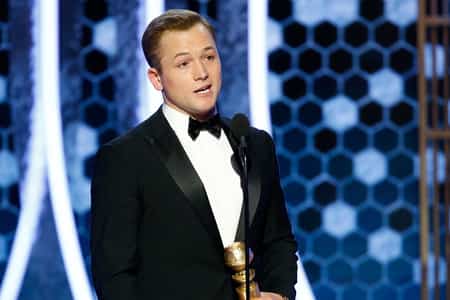 The Elton John of the Rocketman, Taron Egerton was swept off his on the 77th Golden Globe Award when he was announced as the winner of the best actor in a motion picture, musical or comedy.